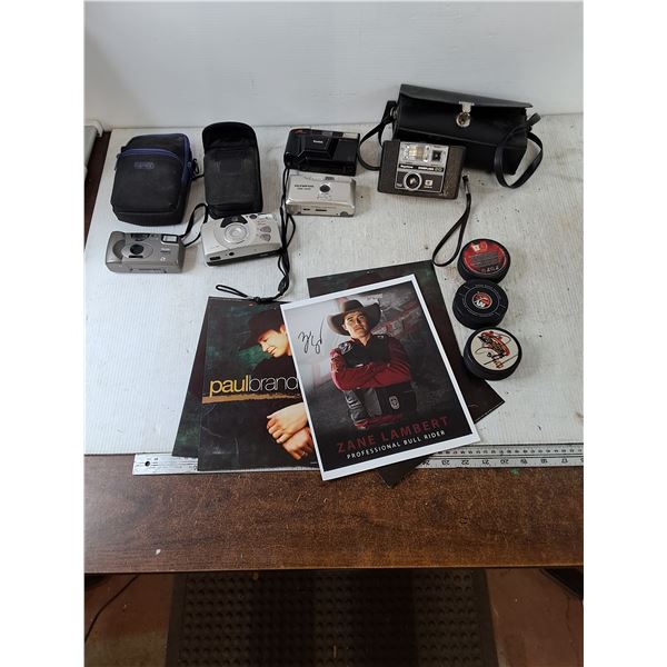 Untested Cameras, Hockey Pucks, Paul Brandt Zane Lambert Memorabilia