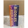 Image 2 : Dare to Ding A Game of Riddles & Reflexes