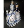 Image 3 : Porcelain Figurine Clock with Romantic Couple and Tea Set Design