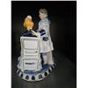 Image 5 : Porcelain Figurine Clock with Romantic Couple and Tea Set Design