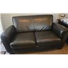 Image 1 : Natuzzi Italian Leather Two-Seater Sofa in Black