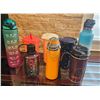Image 1 : Seven Water Bottles in Various Styles and Colors