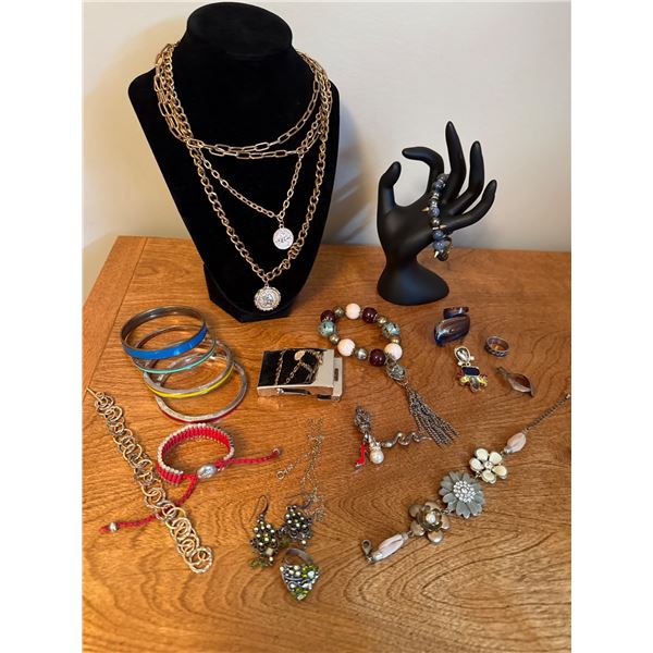 Jewelry Collection Featuring Necklaces, Bracelets, and Rings