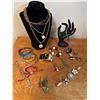 Image 1 : Jewelry Collection Featuring Necklaces, Bracelets, and Rings