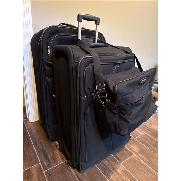 Two Black Wheeled Luggage Pieces with Matching Carry-On Bag