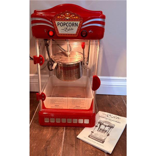 Retro-Style Popcorn Makers in Red and Pink with Instruction Manuals