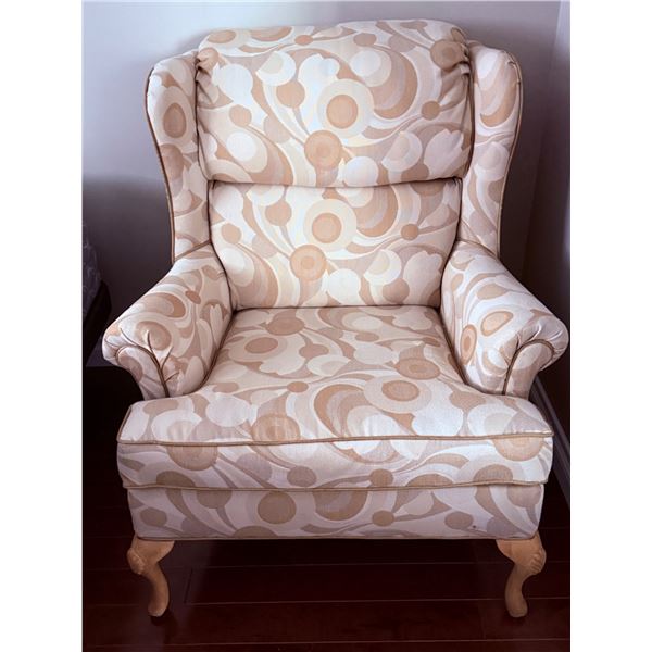 Upholstered Wingback Armchair with Beige and Cream Swirl Pattern