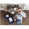 Image 1 : Kitchenware and Home Linens Lot with Wall Clock and Decor