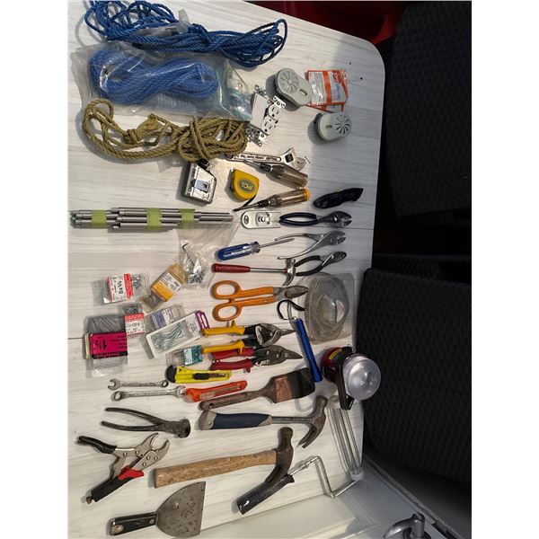 Hand Tools and Supplies with Measuring Tape, Pliers, and Utility Knives