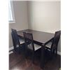 Image 1 : Four-Piece Dark Wood Dining Set with Rectangular Table and Slatted-Back Chairs