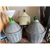 Image 1 : Three Wicker-Covered Glass Demijohn Bottles with Funnels
