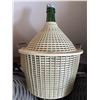 Image 4 : Three Wicker-Covered Glass Demijohn Bottles with Funnels