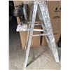 Image 2 : Utility Lot: Ladder, Storage Shelves, Circular Saw, and Trash Bins