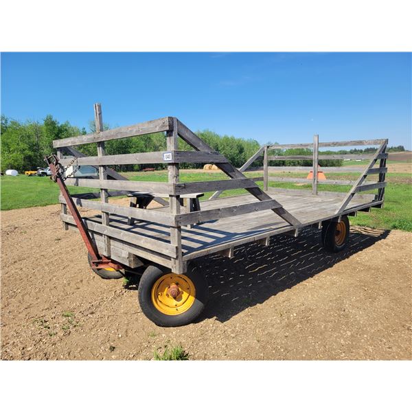 8 X 14ft Antique hay rack on 4 wheel rubber tire wagon.