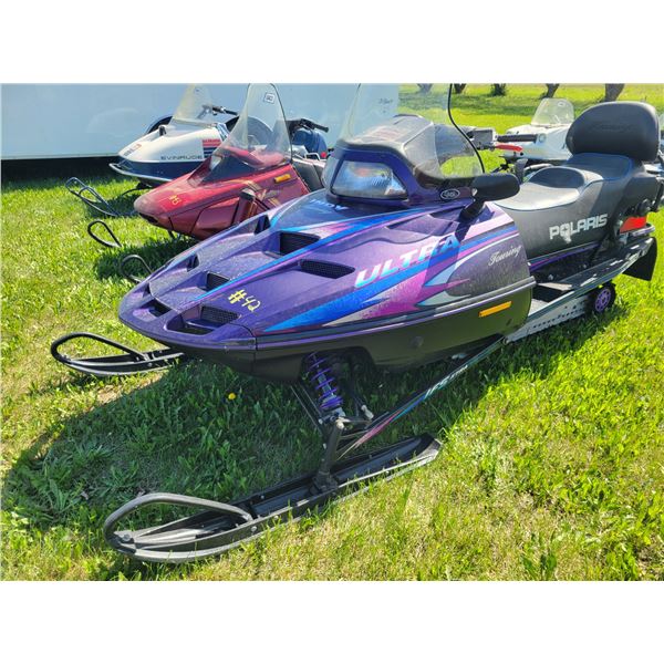 1998 Polaris Ultra touring 2 seater snow mobile. Showing 991km, electric start & reverse, tow hitch,