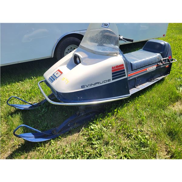 Evinrude Quiet Flite snowmobile. 2 seater, twin cyl, elec. start, reverse. Runs with a prime, wide t