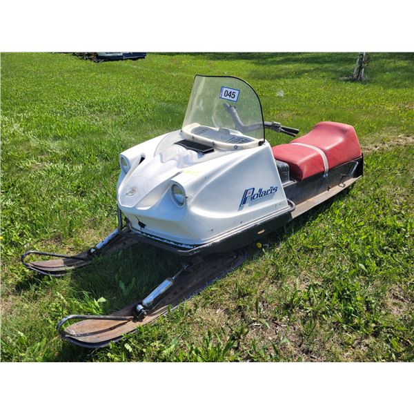 1971 Polaris snowmobile. Twin cyd. free air. Runs with a prime. Showing 2171 miles. S/N: 0704951.