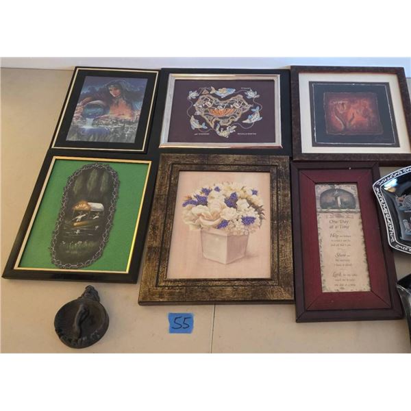 Wall Decor Featuring Framed Pictures and Decorative Plates