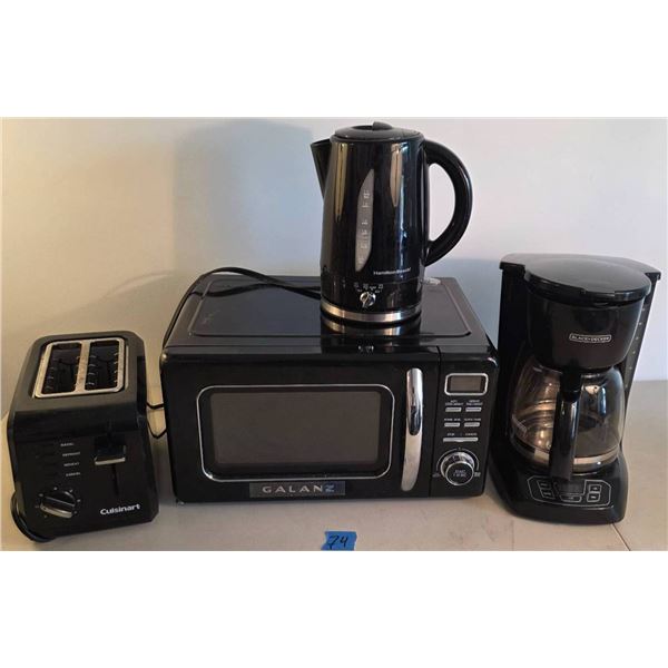 Kitchen Appliances Including Microwave, Toaster, Coffee Maker, and Electric Kettle