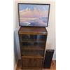 Image 1 : Wooden Display Cabinet, Tower Fan, and Framed Beach Painting