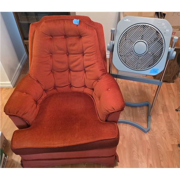 Upholstered Orange Armchair and Box Fan on Stand
