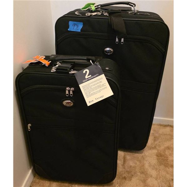 Two Ron Voyager Soft-Sided Black Suitcases With Tag