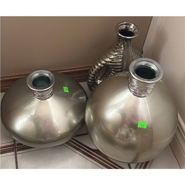 Three Silver-Tone Decorative Vases with Varied Designs