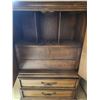 Image 2 : Wooden Armoire with Ornate Panels and Storage Drawers