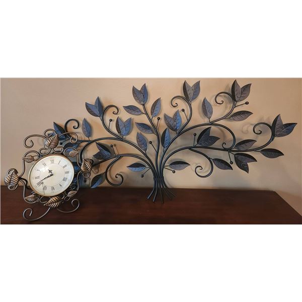 Metal Clock With Roman Numerals and Wall-Mounted Leaf Motif Decor