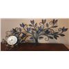 Image 1 : Metal Clock With Roman Numerals and Wall-Mounted Leaf Motif Decor