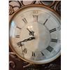 Image 2 : Metal Clock With Roman Numerals and Wall-Mounted Leaf Motif Decor