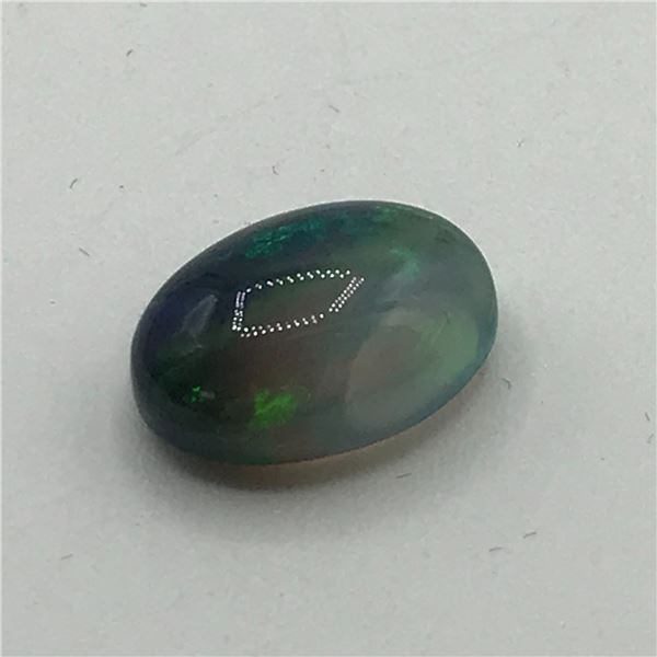 OVAL CABOCHEN 5.53CT BLACK/WHITE AA - JEWEL SCAN APPRAISAL $2,073