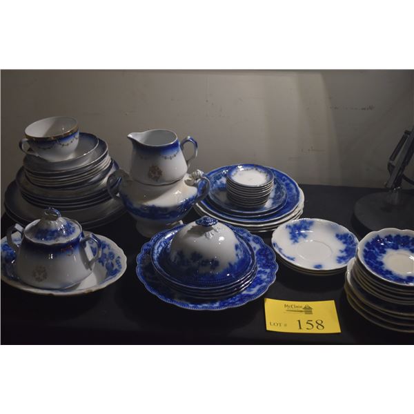 COLLECTION OF FLOW BLUE DISHES, WARMER, SUGAR BOWL, CUP, ETC. (54 PCS)