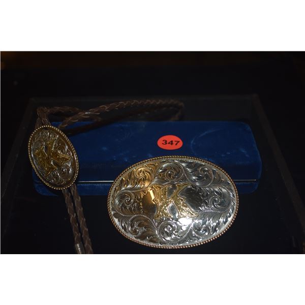 800 SILVER BOLO TIE & GERMAN SILVER BELT BUCKLE, MONTANA SILVERSMITHS, COLUMBUS, MONT. (2 PCS)