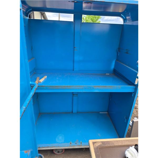 Two Metal Blue Carts On Wheels