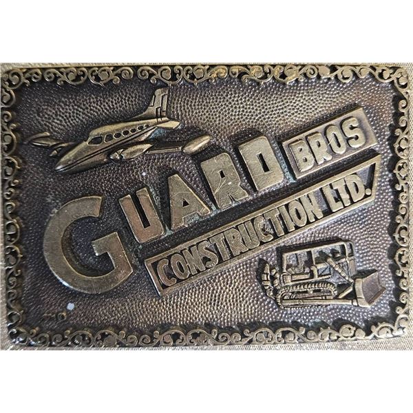 Guard Bros Construction Ltd Cast Metal Belt Buckle with Embossed Plane and Train Design
