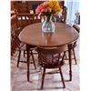 Image 1 : Oval Extendable Oak Dining Table with Four Spindle-Back Chairs