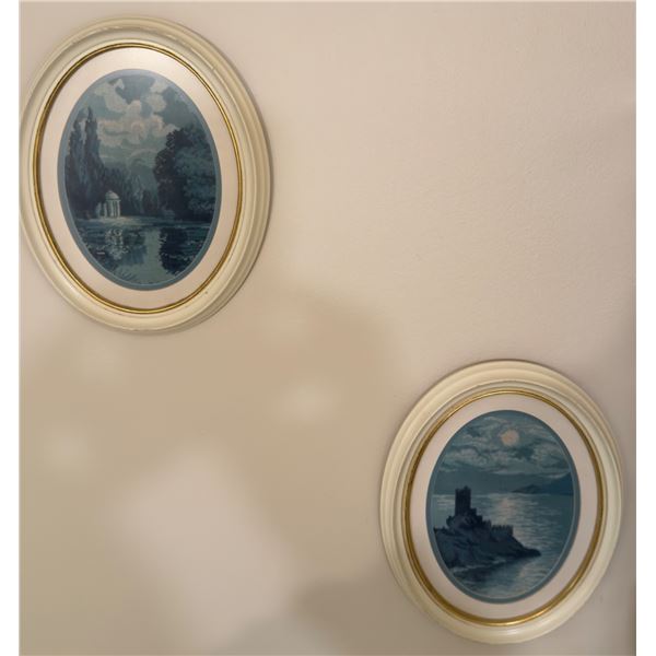 Two Framed Oval Artwork Prints with White and Gold Frames