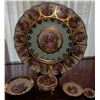 Image 1 : Limoges French Porcelain Decorative Plate Set with Rococo-Inspired Motifs and Gilded Accents