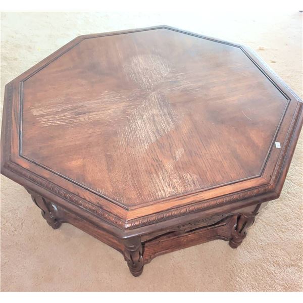Octagonal Wooden Coffee Table With Carved Details and Turned Legs