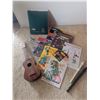 Image 1 : Musical Instrument Lot Featuring Ukulele, Recorders, and Songbooks