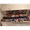 Image 1 : Extensive Collection of VHS Tapes Featuring Cult Classics and Movies