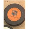 Image 3 : Four Hockey Sticks, Four NHL-Themed Pucks, and Two Training Cones