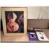 Image 1 : Framed Art Print Featuring Double Bass and Fishnet Stockings with Collection of Guitar Music Books
