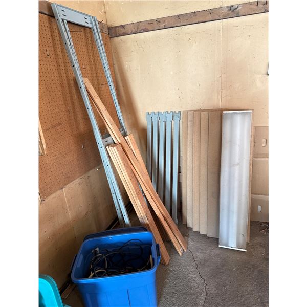 Workshop Materials Including Shelving Frames, Wood Planks, and Electrical Cables