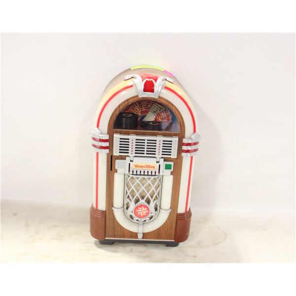 WURLITZER MICRO CASSETTE PLAYER W TAPES  UNTESTED