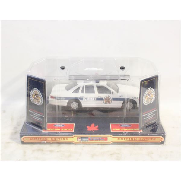 DIECAST CANADIAN POLICE CAR IN BOX