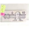 Image 1 : $10 CANADIAN BILL, APPEARS TO BE CUT CROOKED,