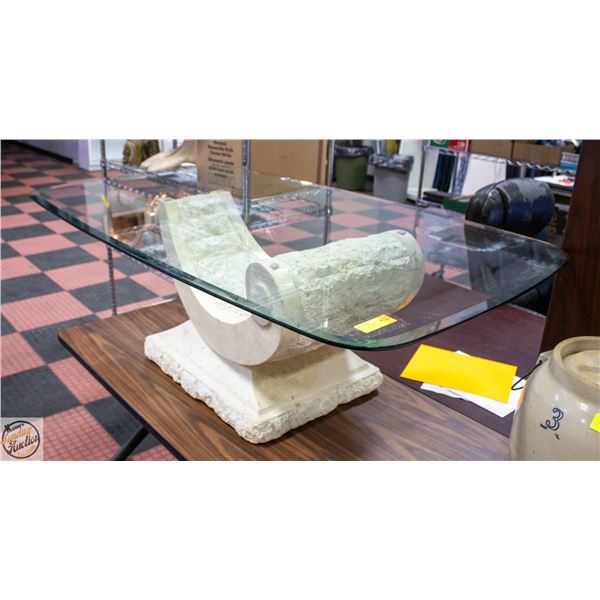 GLASS TOP COFFEE TABLE WITH STONE ABSTRACT BASE