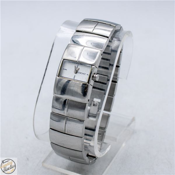 DKNY LADIES BANGLE STYLE WATCH WITH NEW BATTERY